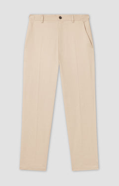 Beige pants on a light gray background