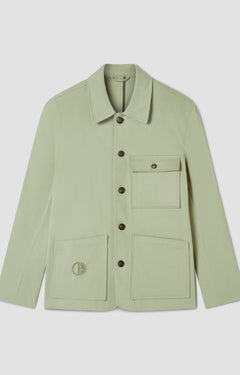 Light green jacket with button details on a light gray background